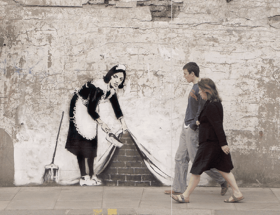 Banksy street art maid cleaning mucama 